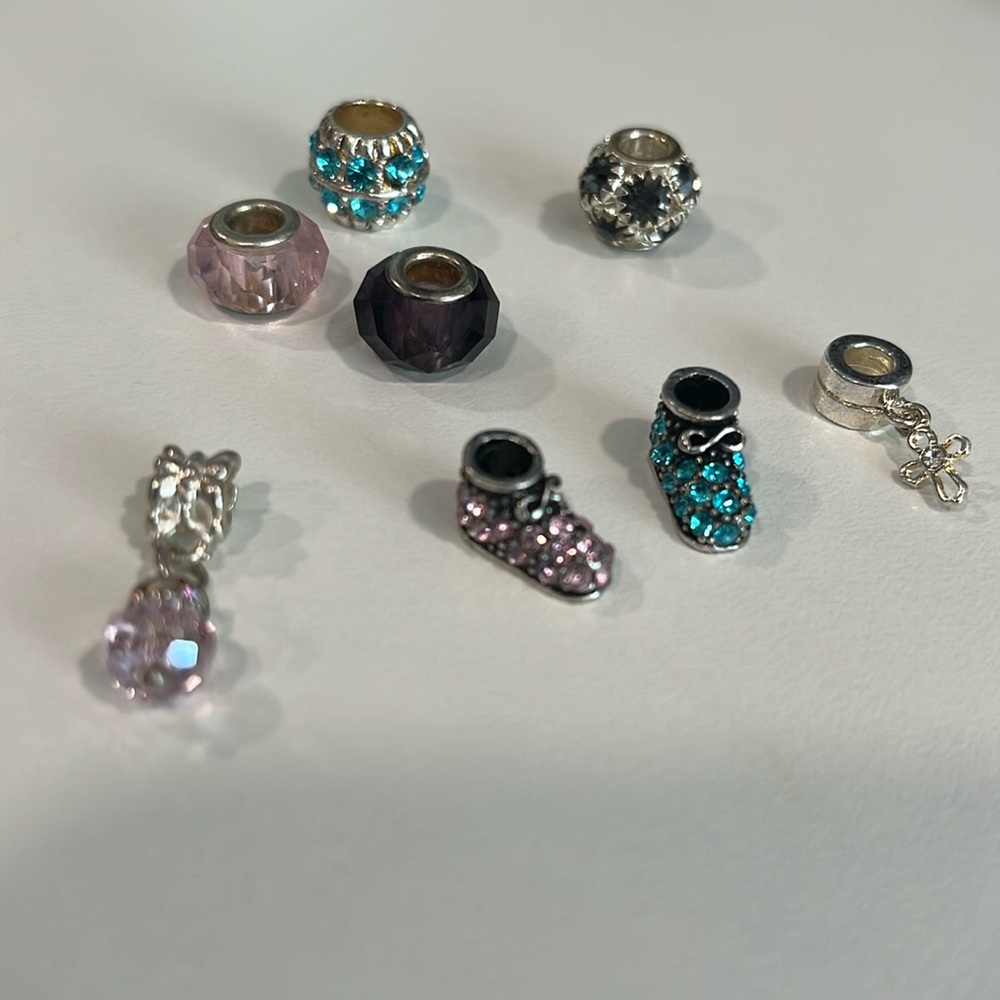 8 unmarked pandora charms- purchased before 2011